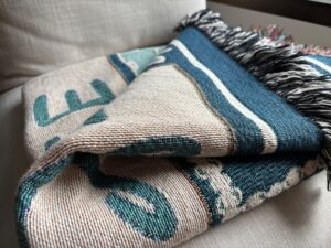 This Lake Life Woven Blanket is perfect as lake gift.